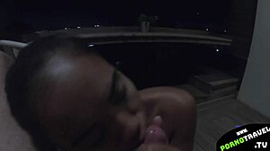 She sucks my dick on the balcony. Thai girlfriend gives outdoor blowjob and swallows cum.