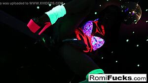 romi plays with a disco ball before stuffing and toying her pussy