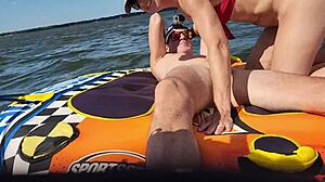 hot athletic couple enjoys anal sex on jetski in lake