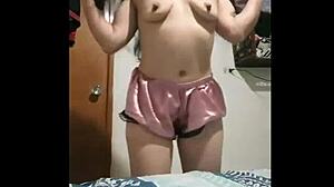 Hey, check out my little slut showing off on webcam.