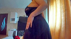 Big boobs and pussy exposed in sexy black outfit details.