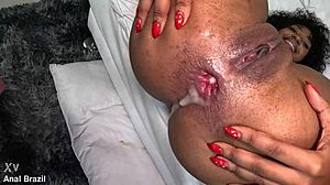 Mulata ana sasuga takes it hairless and shaved in her tight brazilian ass with anal fisting and creampie in wet amateur action.