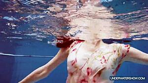 Martina the hot croatian continues her hot show... uh with bikini and underwater nudist vibes in pool and beach settings.