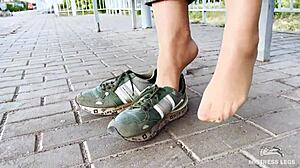 tan nylon soles with blue jeans teasing on the bench outdoors 😘