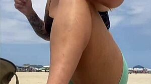 The young guy hadn't even fucked her swollen pussy yet when he suggested bringing a friend to join them on the beach for more.