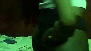 Horny Kenyan crossdresser strips down and fingers wide-open asshole in solo play.