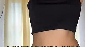 Latina babe does an erotic solo striptease with small tits and clothes ripping off