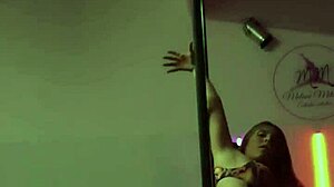 Female Doctor Displays Moves On Pole In Hospital Setting