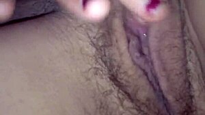 katrina's fingers explore her serena in solo play