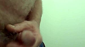 Rustyas1 masturbates solo in public toilet.