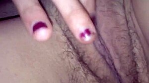 katrina's fingers explore her serena in solo play