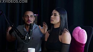 In this swing cast episode, the naughty Brazilian Morena Val Mineirinha strips naked to show her tits, gets her pussy licked after admitting she likes fingering men's asses, and her dom calls her names during sex in sheer red lingerie.