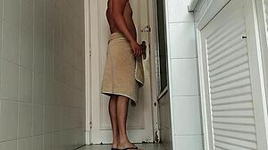 I grab my big cock and head to the bathroom for intense solo masturbation on the armchair