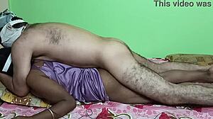 Mature Indian housewife lies on bed in nightdress during boyfriend's back side sex