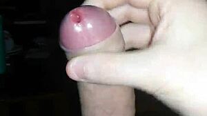 Jerking off solo to transsexual porn until cumshot jizz covers everything