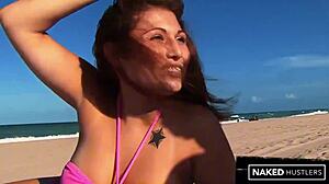 This amazing Latina with big ass and monster cock lover gets fucked hard on Miami beach sand in bathing costume