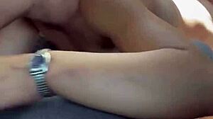 Pretty young hooker chats on the phone with her boyfriend during a naked public encounter