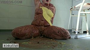 What happens when Kinkylilqt crushes a cake against her backside and then explores herself curiously