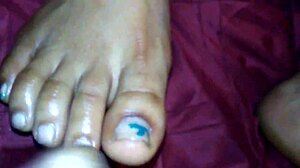 Ebony Delivers Intense Foot Job Leading To Explosive Cumshot