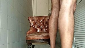 I grab my big cock and head to the bathroom for intense solo masturbation on the armchair