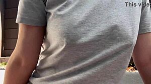 Horny Italian milf with big tits and nipples smokes outdoors in fetish close-up