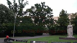 this cute young 18+ teen girl joins two guys for a public outdoor threesome in the city center, sucking cocks and getting fucked doggystyle on the street