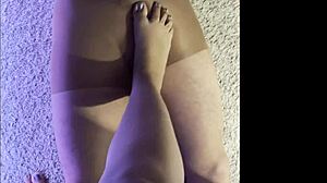 subtly teasing husband in my damp pantyhose during intimate foot play session