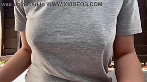 Horny Italian milf with big tits and nipples smokes outdoors in fetish close-up