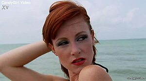 I'm so turned on by Hollis Ireland in that micro bikini, showing off her pretty big pussy lips.