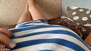 Hey check this pantyless milf caressing her wet pussy to orgasm in homemade solo vid