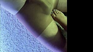 subtly teasing husband in my damp pantyhose during intimate foot play session