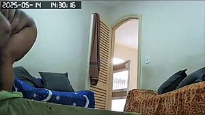 Hidden camera catches busty Brazilian BBW maid cleaning house naked, showing huge tits and ass