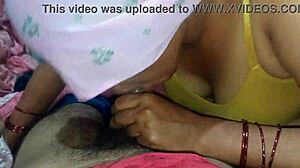 Indian housewife enjoys sucking large dark penis for facial finish