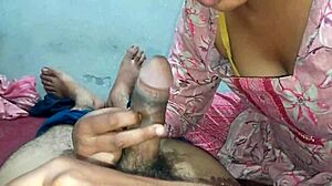 Indian housewife enjoys sucking large dark penis for facial finish