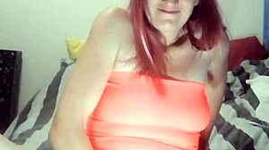 Nympho slut fingers her wet shaved pussy intensely. She fists until squirting in homemade close-up action.