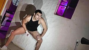 Sexy doctor in cosplay uses gloves for intense session with muscular bodybuilder patient