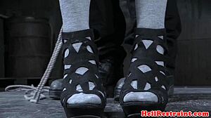 Restrained sub receives waxing and whipping from dominant maledom in close-up