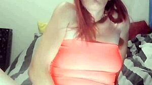 Nympho slut fingers her wet shaved pussy intensely. She fists until squirting in homemade close-up action.