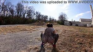 She struts in thong bodysuit along the docks, flashing her big ass outdoors