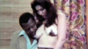 Vintage dark lantern entertainment presents classic London interracial with hairy pussy and big black cock action.