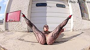 She struts in thong bodysuit along the docks, flashing her big ass outdoors