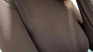 Stepmother caresses milky tits to orgasm in homemade webcam session.