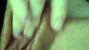 Russian milf rubs her wet shaved pussy in close-up homemade masturbation