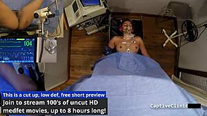 Rebel Wyatt gets captured by government agents who slap her pierced nipples and spread her hairy pussy in latex humiliation.