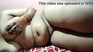 Indian bhabhi girl strips off clothes to satisfy hot sex desire with sensual moves and touches