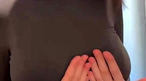 Stepmother caresses milky tits to orgasm in homemade webcam session.