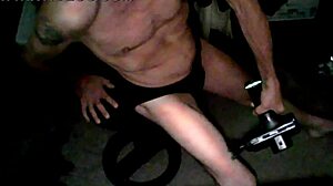 Percussion Massager Applied To Thigh In Underwear On Stool