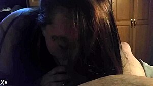 the slut wife takes on a blowjob for her daddy, sucking his cock eagerly in the scene