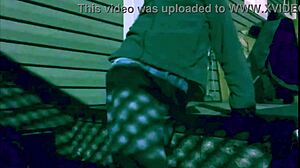 Skinny amateur stretches in leggings at night, creating intriguing lattice shadows on ass and legs during homemade workout.