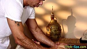blonde babe gives masseur a handjob 😏